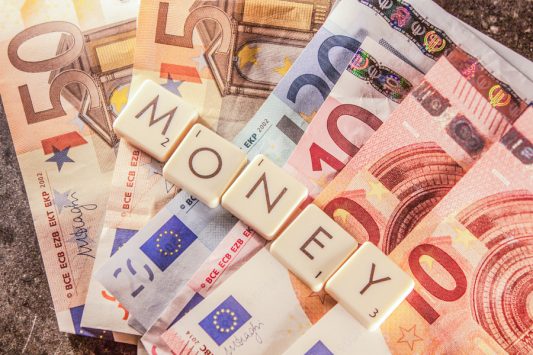Money text on euro bills by Dani Rönneberg on 500px