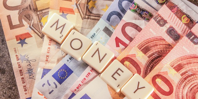 Money text on euro bills by Dani Rönneberg on 500px